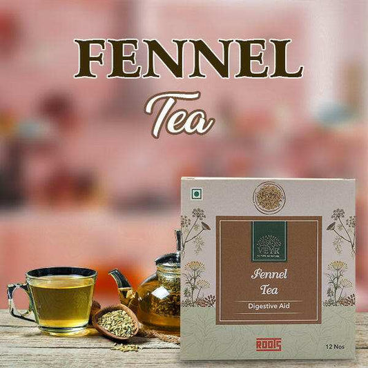 Steaming cup of fennel tea with fennel seeds and fresh fennel bulb on wooden table