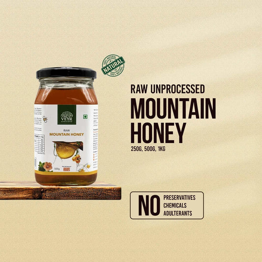 Bottle of pure VEYR Mountain Honey with a copper-gold shade from Anamalai Tiger Reserve
