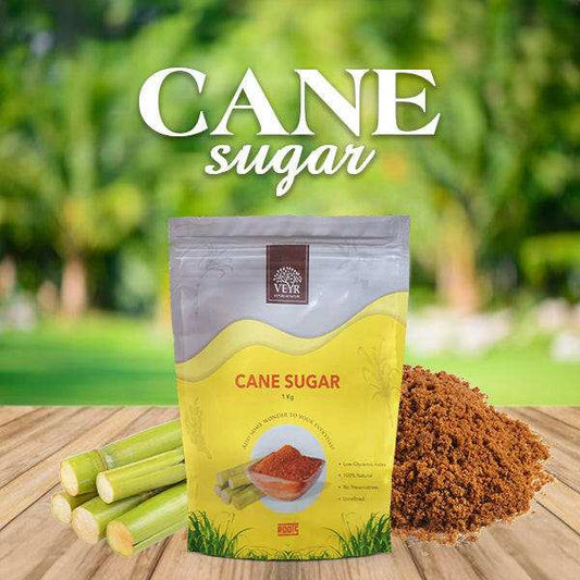 Close-up of golden to dark brown non-centrifugal cane sugar jaggery powder showcasing its natural, unrefined texture and color