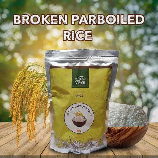 Close-up of broken parboiled rice grains scattered on a surface